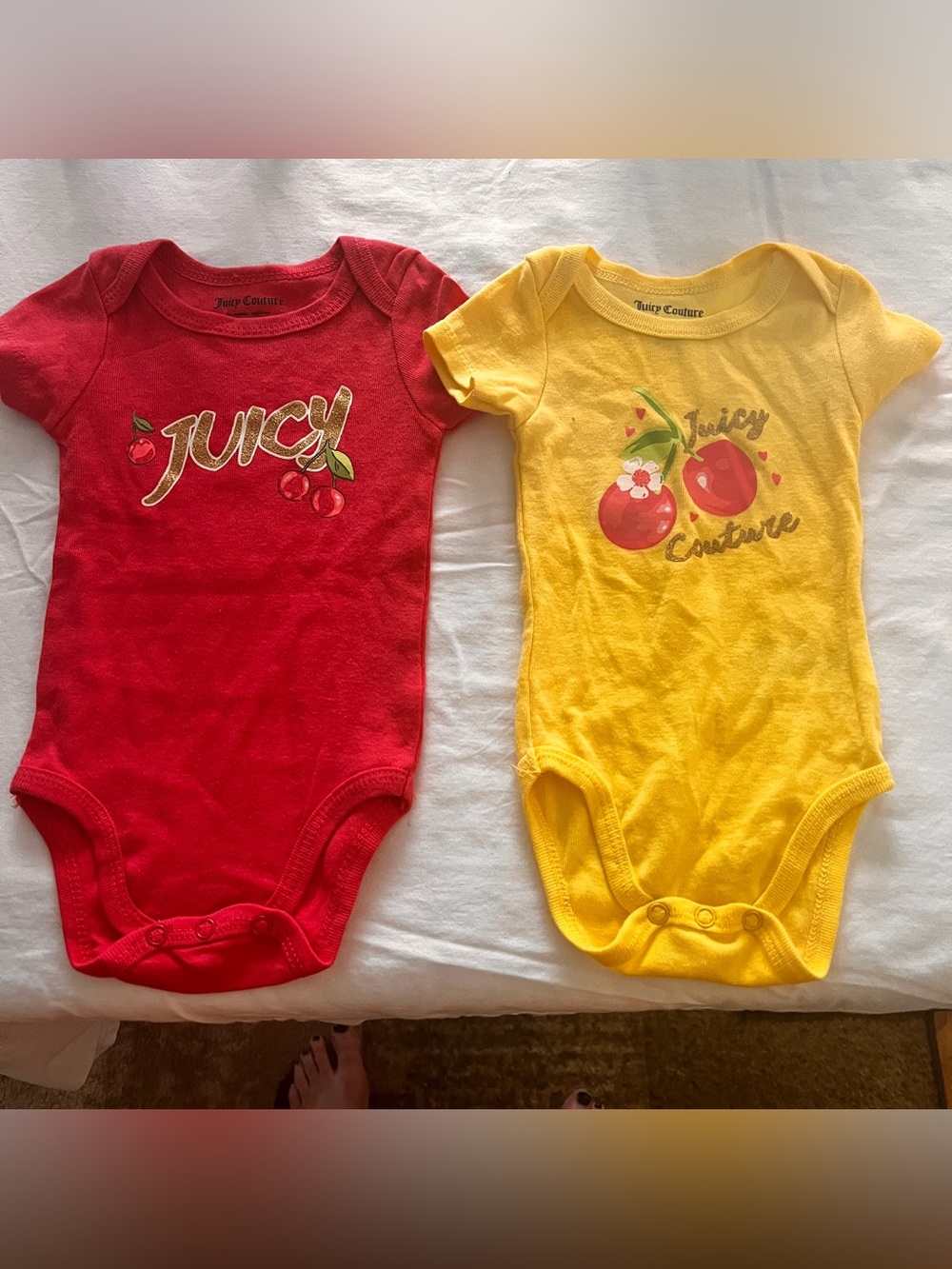 Juicy Couture Red and Yellow Cherry Graphic One-Piece Bodysuits